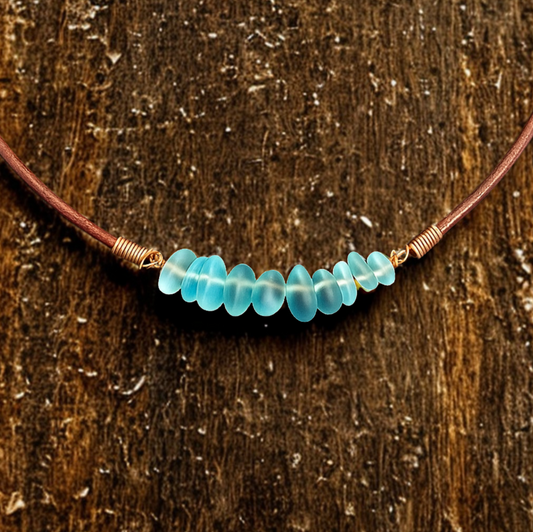 Frosted Blue Sea Glass & Leather Necklace – Handmade Boho Jewelry with Copper Wrap Detail